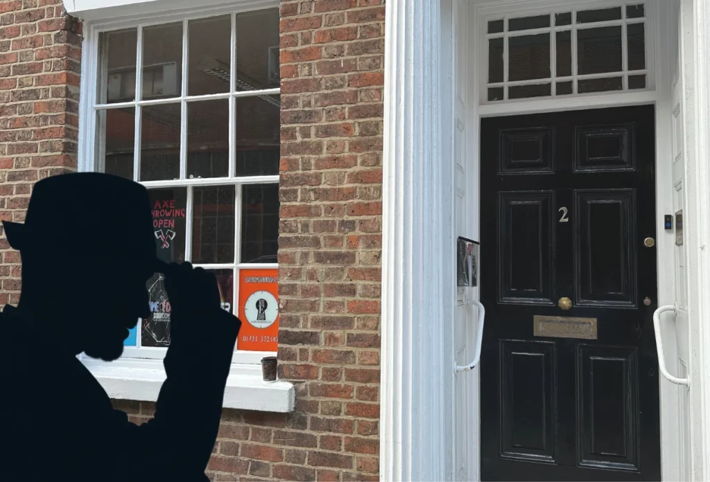 Outside of Mr E Rooms escape rooms in Scarborough a grand building with large porch and front door