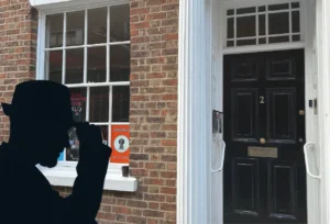 Outside of Mr E Rooms escape rooms in Scarborough a grand building with large porch and front door